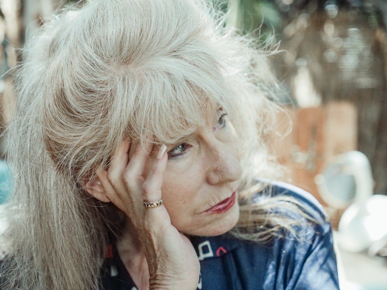 senior woman looking depressed